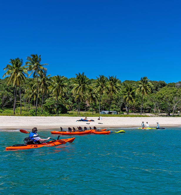 Scenic Eclipse guests kayaking at Percy Island, Australia