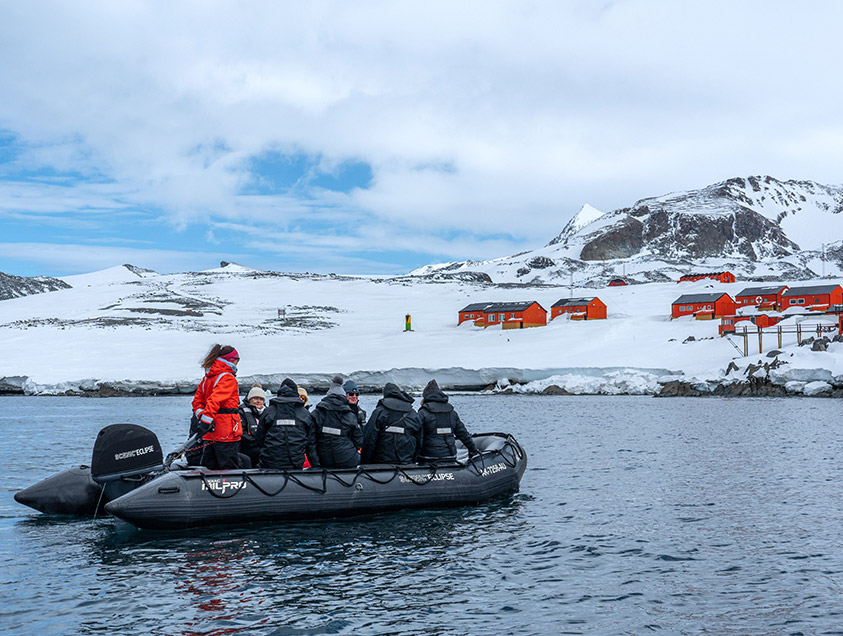 A group on a Zodiac headed to shore