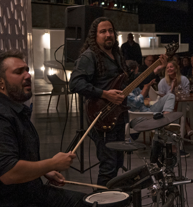 Band playing at a bar in the evening