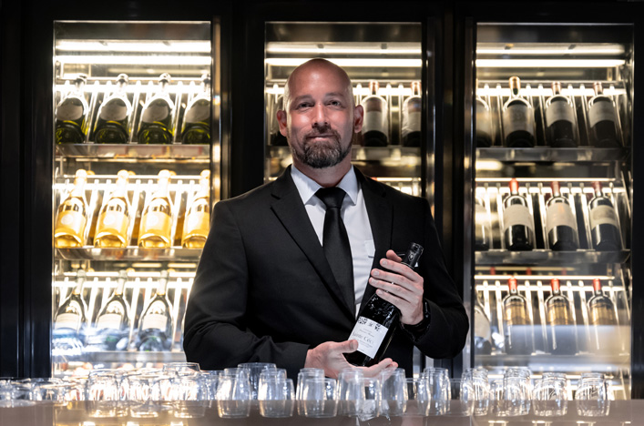 Bar staff at Champagne Bar on board Scenic cruise ship