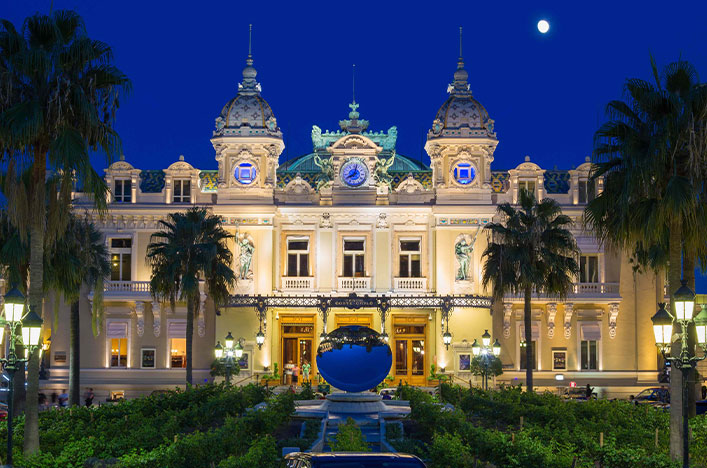Old Casino in monte carlo at night under a full moon 