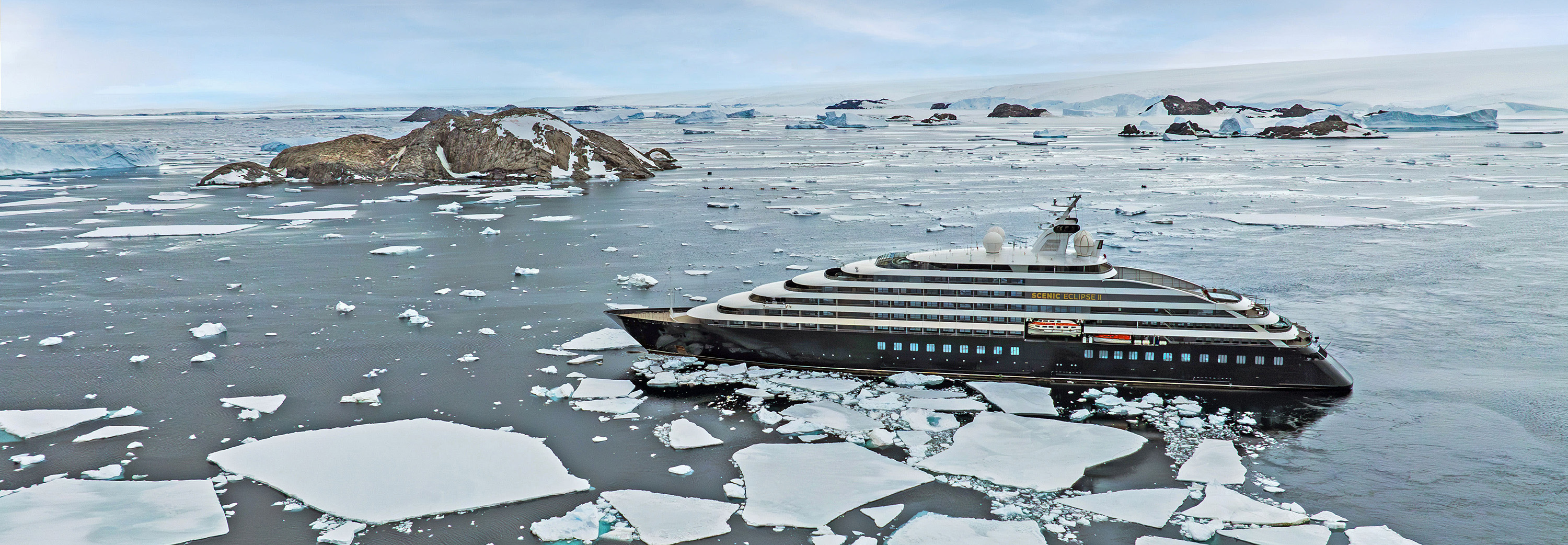 Scenic Eclipse II cruising Penguin Point, Watt Bay, East Antarctica