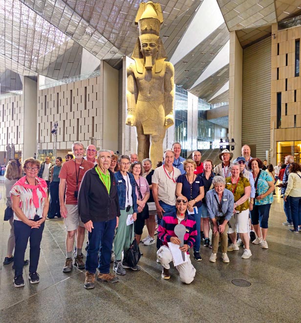 Scenic guests in front of Statue of Queen Hatshepsut, Grand Egyptian Museum
