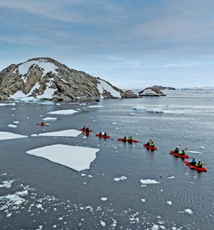 Scenic Eclipse guests kayaking in Watt Bay, East Antarctica